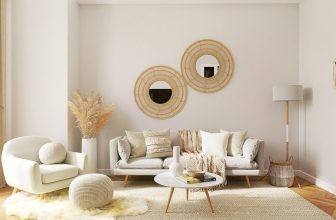 A stylish living room featuring modern decor elements like colorful cushions, textured throws, and ambient lighting.