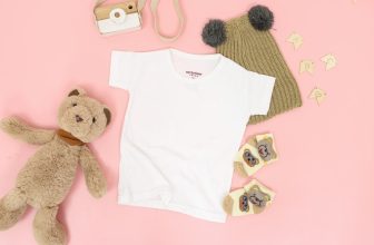 A collection of modern baby products designed for busy parents, including a smart stroller, baby monitor, and multifunctional diaper bag, set in a cozy home environment.