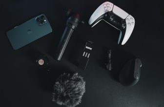 A collection of modern smart tech gadgets on a clean workspace, showcasing devices that enhance daily convenience.